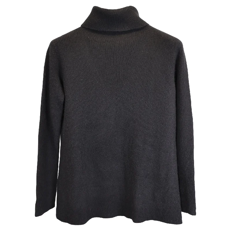 The Row Ribbed Turtleneck Sweater in Black Wool